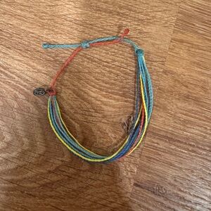 Pura Vida blue yellow and red string pull tie bracelet​​​